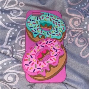 silicone case with teal&pink sprinkle donuts on it